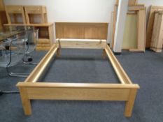 A contemporary oak 4 ft bed frame (no mattress slats)
