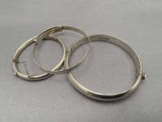 Three silver bangles CONDITION REPORT: 25g