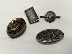 Four vintage silver brooches