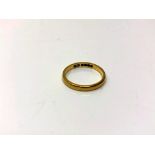 An 18ct gold band ring, 1.