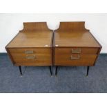 A pair of mid 20th century teak G Plan E Gomme designed two drawer bedside chests