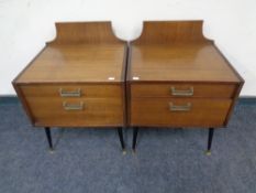 A pair of mid 20th century teak G Plan E Gomme designed two drawer bedside chests