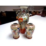 A pair of Japanese vases depicting geishas, height 20.