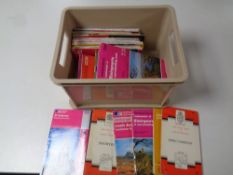 A box containing a quantity of ordnance survey maps