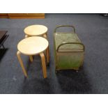 A green loom storage stool together with two contemporary circular stools