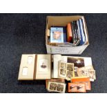 A box of volumes relating to photography, album of monochrome photographs,