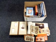 A box of volumes relating to photography, album of monochrome photographs,