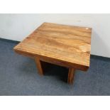 A square sheesham wood coffee table,
