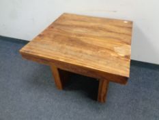 A square sheesham wood coffee table,