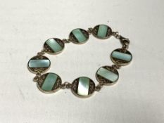 A silver stone set bracelet