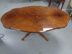 An Italianate shaped pedestal coffee table together with a further coffee table