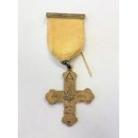 A silver cross medal dated 1867-1967
