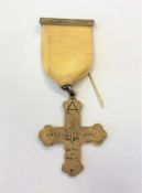 A silver cross medal dated 1867-1967