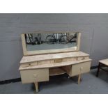 A mid 20th century melamine dressing table