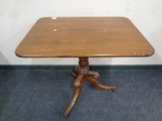 A Victorian mahogany tilt topped pedestal occasional table