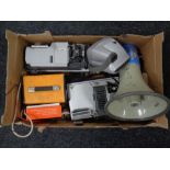 A box containing Polaroid camera, projectors,