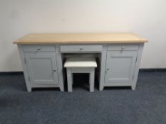 A contemporary oak topped twin pedestal dressing table on painted base fitted cupboards and drawers