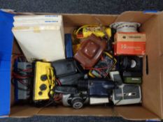 A box containing assorted cameras, compass, Bresser monocular, 3D Master Viewer,