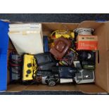 A box containing assorted cameras, compass, Bresser monocular, 3D Master Viewer,