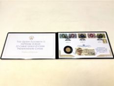 The Queen Elizabeth II Sapphire Jubilee 22ct Gold £1 Coin Presentation Cover, 8g.