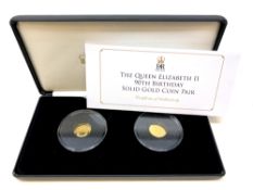 The Queen Elizabeth II 90th Birthday Solid Gold Coin P:air, each struck in 9ct gold and weighing 1g,