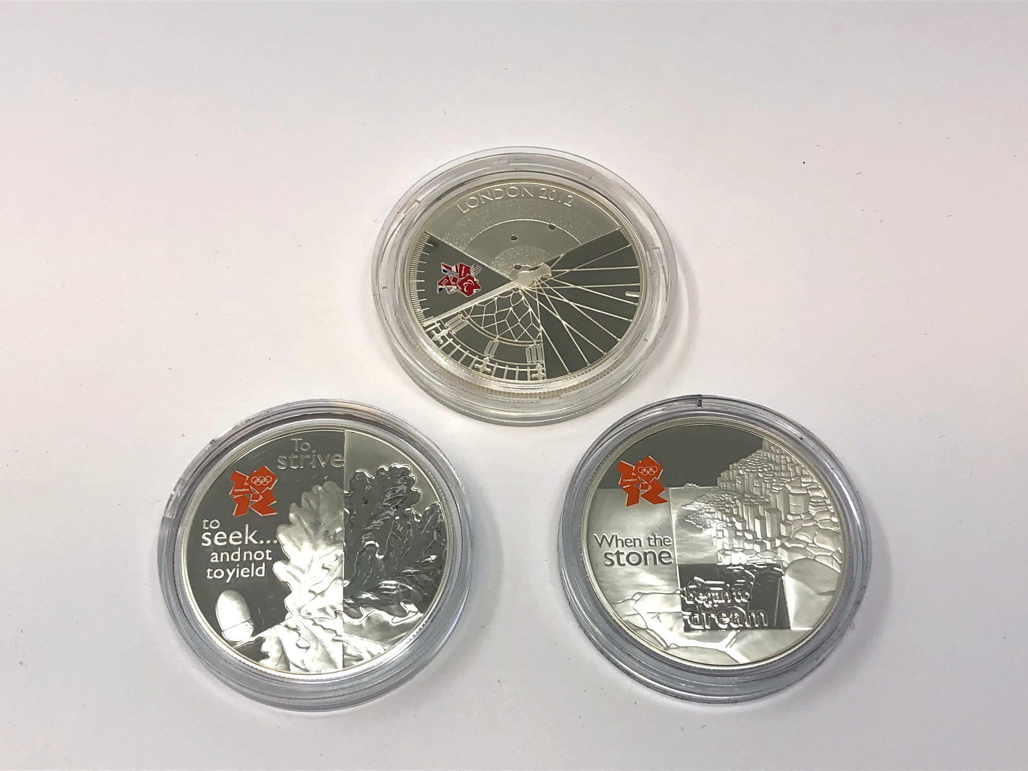 Three London 2012 Olympics silver proof commemorative crowns.