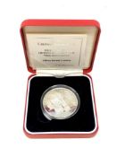 A Queen Elizabeth II 70th Birthday Silver Proof Crown, boxed with certificate of authenticity.