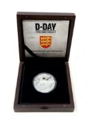 A D-Day 70th Anniversary Jersey Silver £5 Coin, boxed with certificate of authenticity.