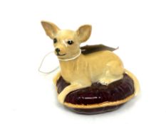 A Beswick china figure : Chihuahua - Lying on Cushion, model 2454, golden brown, gloss, height 7 cm.