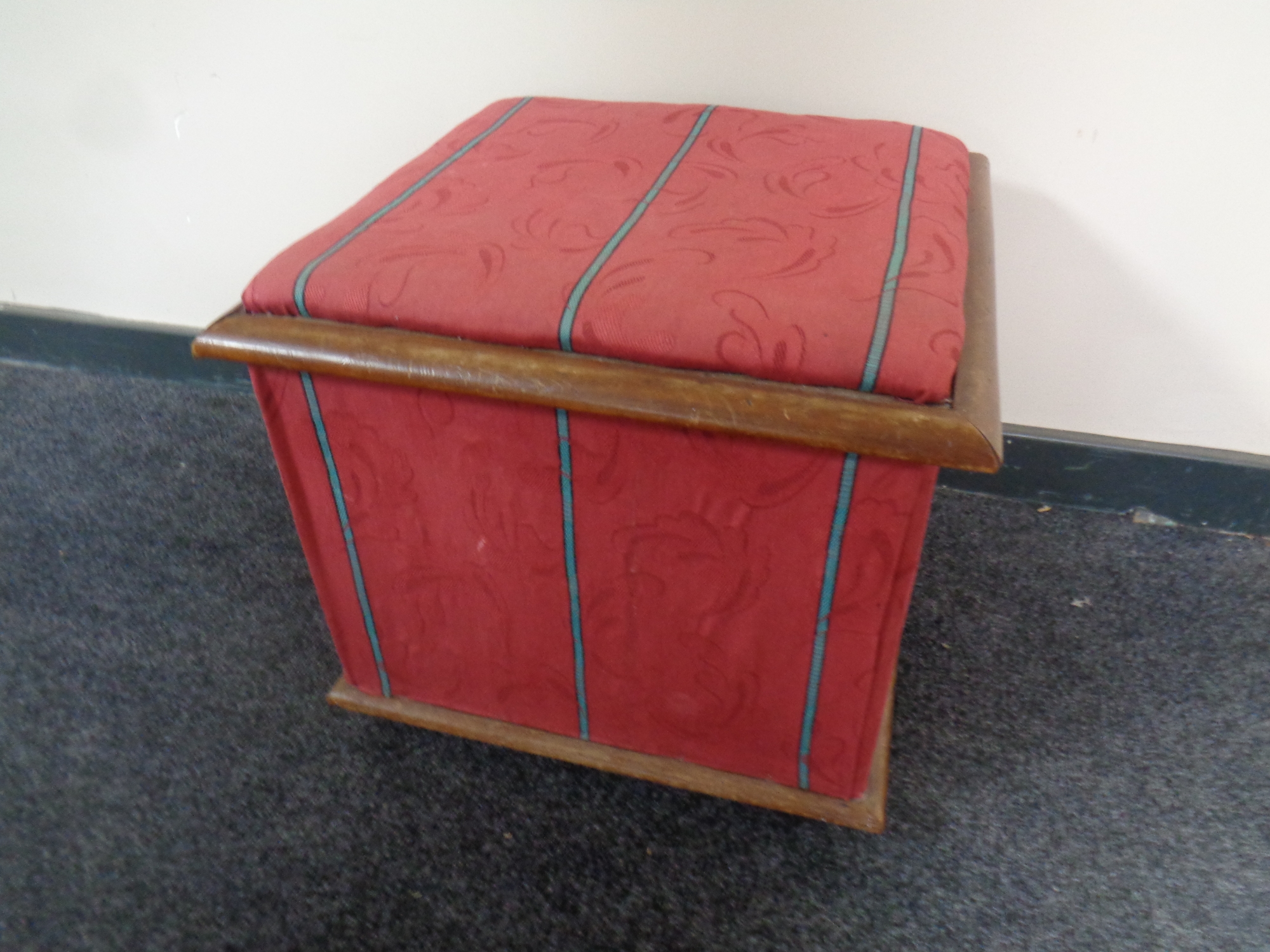 A 19th century mahogany upholstered storage ottoman stool