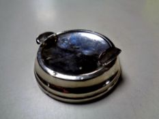 A silver ashtray