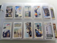 An album containing a large quantity of Wills cigarette cards to include radio celebrities,