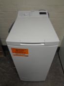 A Hotpoint Slimline top loading washing machine,