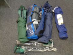 A tent in carry bag and five assorted folding camping chairs,