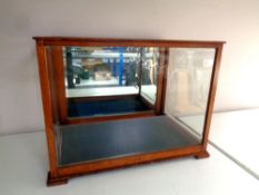 An Edwardian mahogany and glass counter top display cabinet