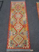 A Chobi Kilim runner 191 cm x 64 cm