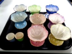 A tray containing eight Maling lustre grapefruit dishes together with two Maling lustre egg cups