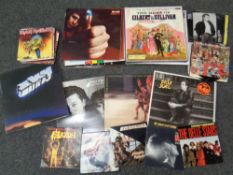 A box containing a small quantity of vinyl LPs and seven inch singles to include classical,