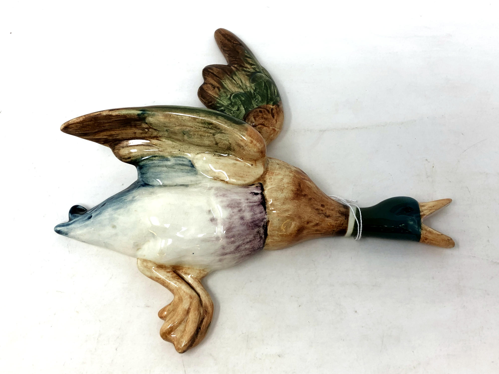 A Beswick china wall plaque : Mallard, model 596/1, brown, teal green and white, gloss,