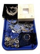 A tray containing assorted costume jewellery, dress rings,