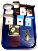 A tray containing costume jewellery, earrings, dress rings,