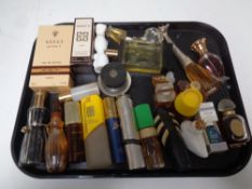 A tray containing assorted perfumes to include Gucci, Paco Rabanne,