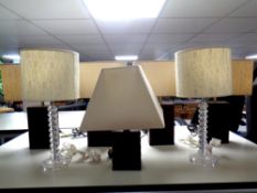 Two pairs of faux leather Marks and Spencer's table lamps with shades together with a further pair