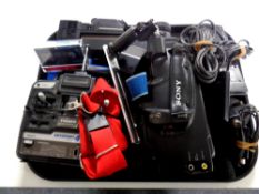 A tray containing a Futaba SkySport four control unit together with a Sony camcorder and