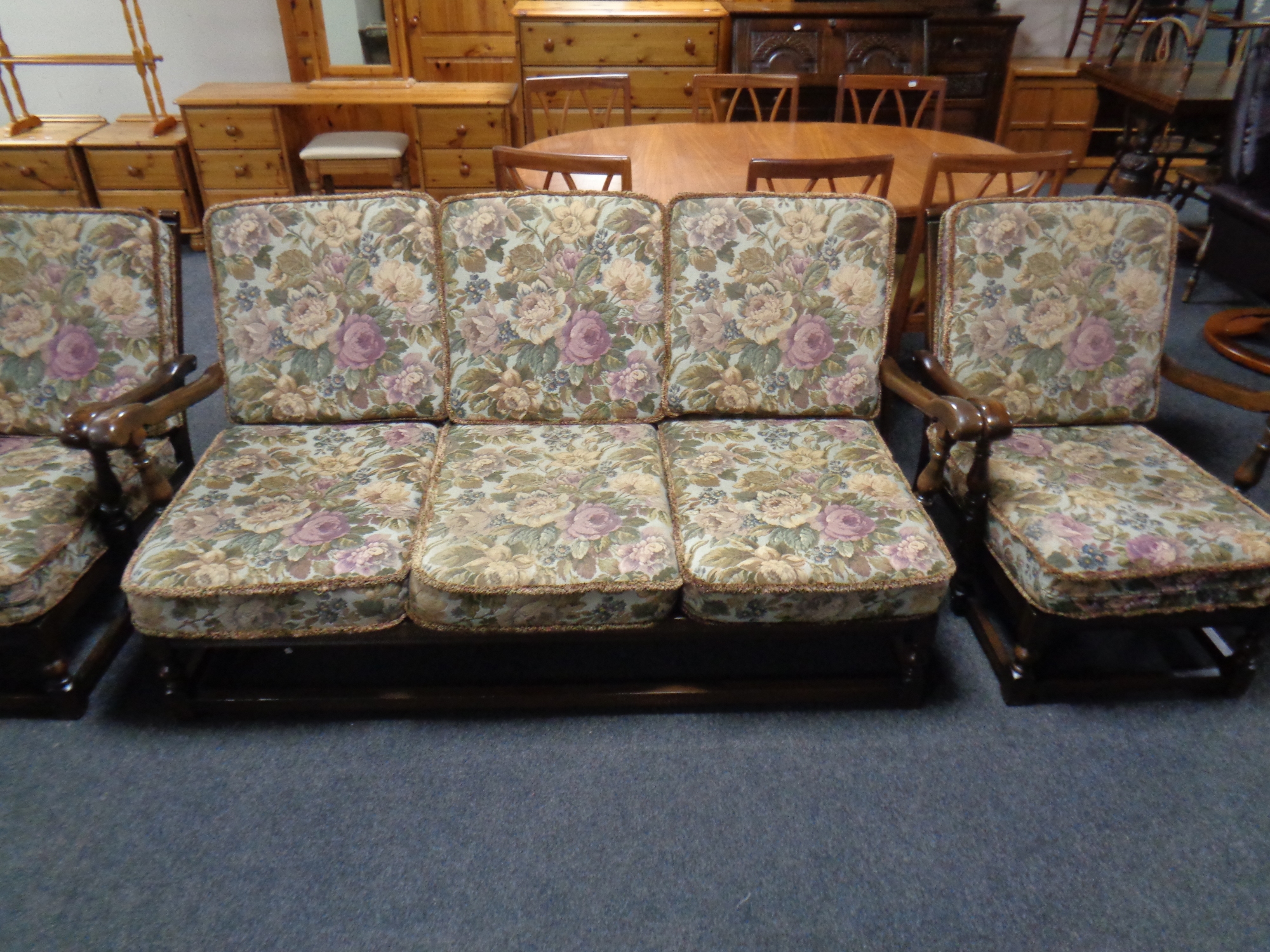 An Ercol wood framed four piece lounge suite comprising of three seater settee, - Image 2 of 3