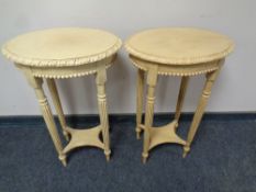 A pair of contemporary French style oval lamp tables on reeded legs,