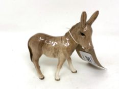 A Beswick china figure : Donkey, model 2110, brown, gloss, height11 cm.