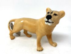 A Beswick china figure : Lioness (Facing Right), model 2097, golden brown, gloss, height 15 cm.