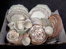 A box of Eternal Beau tea and dinner service,