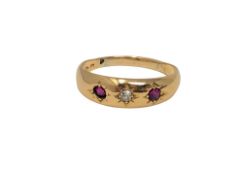 An 18ct gold diamond and garnet ring, size O1/2 CONDITION REPORT: 2.